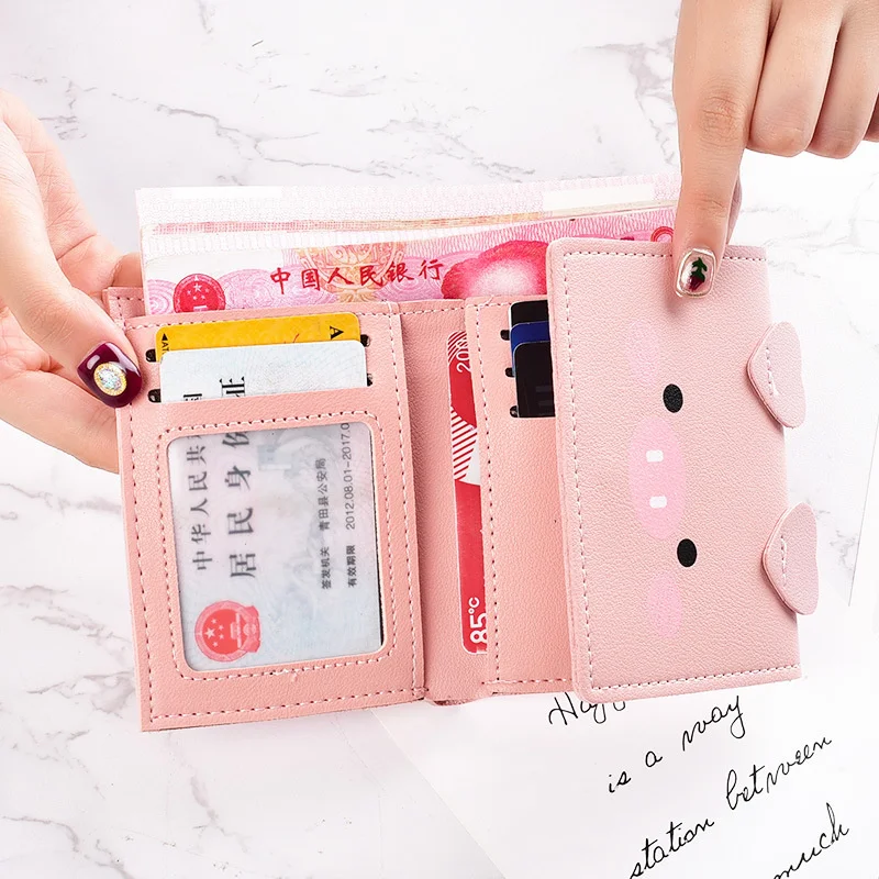 Cartoon pig small wallet female short soft leather Korean student cute three fold small wallet multi card zero wallet