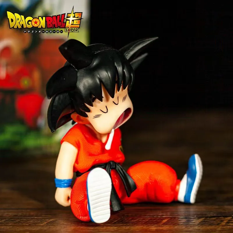 10cm Dragon Ball Z Anime Kakarotto Gk Pvc Action Figure Sitting Posture Sleep Sun Wuku Handmade Model Ornament Decoration Gifts