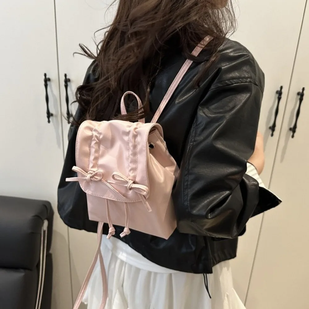 Zaino con fiocco dolce Y2k Zaino in pelle PU tinta unita Stile coreano Borsa da scuola per studenti di grande capacità Studenti