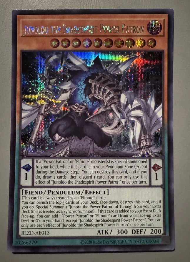 Yugioh KONAMI Duel Monsters BLZD-AE013 Junoldo, el Espíritu de las Sombras, Patrón de Poder, Rara Secreta, Colección Asiática en Inglés, Tarjeta Mint