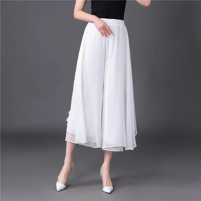 Pantalon Capri taille haute élastique pour femmes, vêtements d'été, ample, à la mode, couleur unie, épissé, en mousseline de soie, jambes larges, nouvelle collection 2025