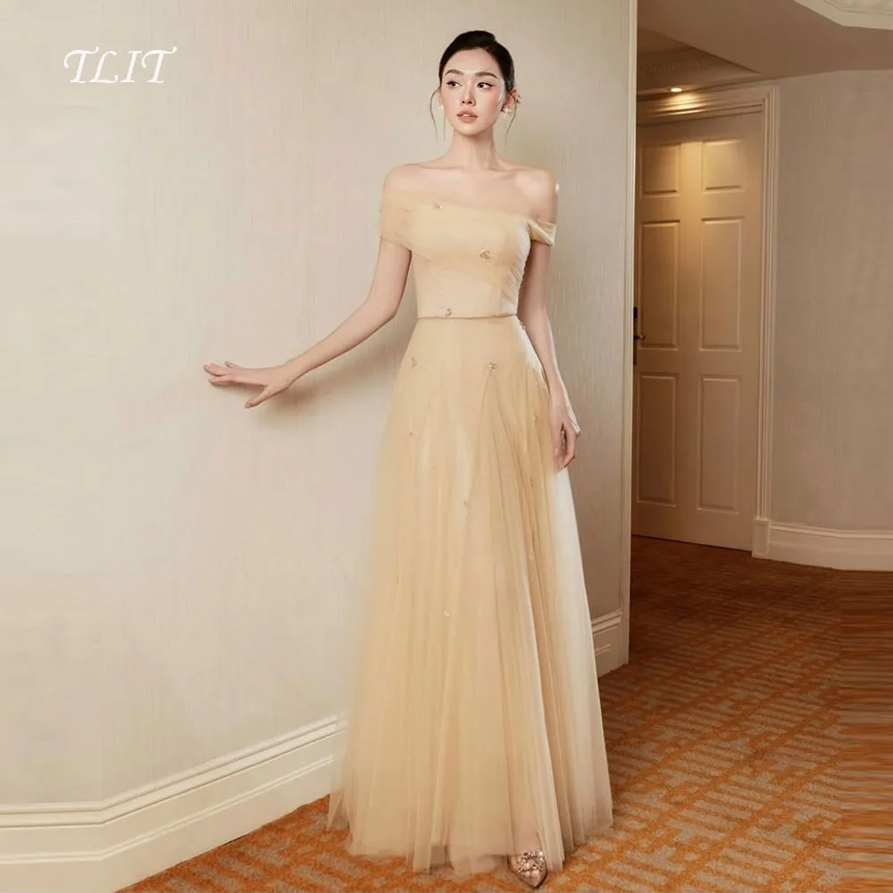 فساتين سهرة أنيقة من التول الحريري باللون الأصفر الفاتح من TLIT مخصصة قبالة الكتف بدون حمالات فساتين حفلات كريستال على شكل حرف a تنورة