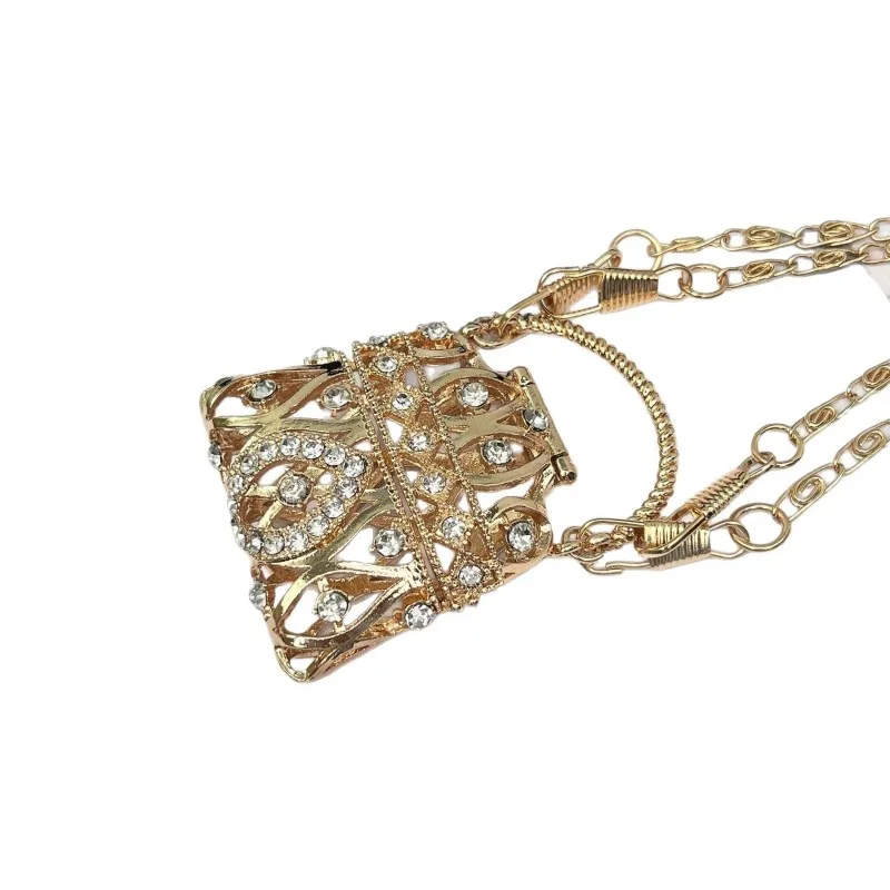 小さな上品な新作リングバッグ、ミニデザインセンスのメタル装飾バッグ、クロスボディ財布、コインパースチェーン