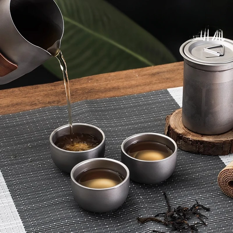 

Lightweight Travel Tea Set with Storage Bag Built-In Strainer Titanium Alloy Tea Cups Teapot Outdoor Camping Hiking Tableware