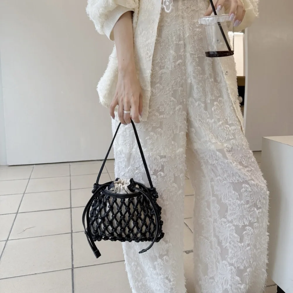 Niche Design Hand-woven Women's Bag 2026 New Armpit Shoulder Messenger Versatile Premium Foreign Style Casual Fashion