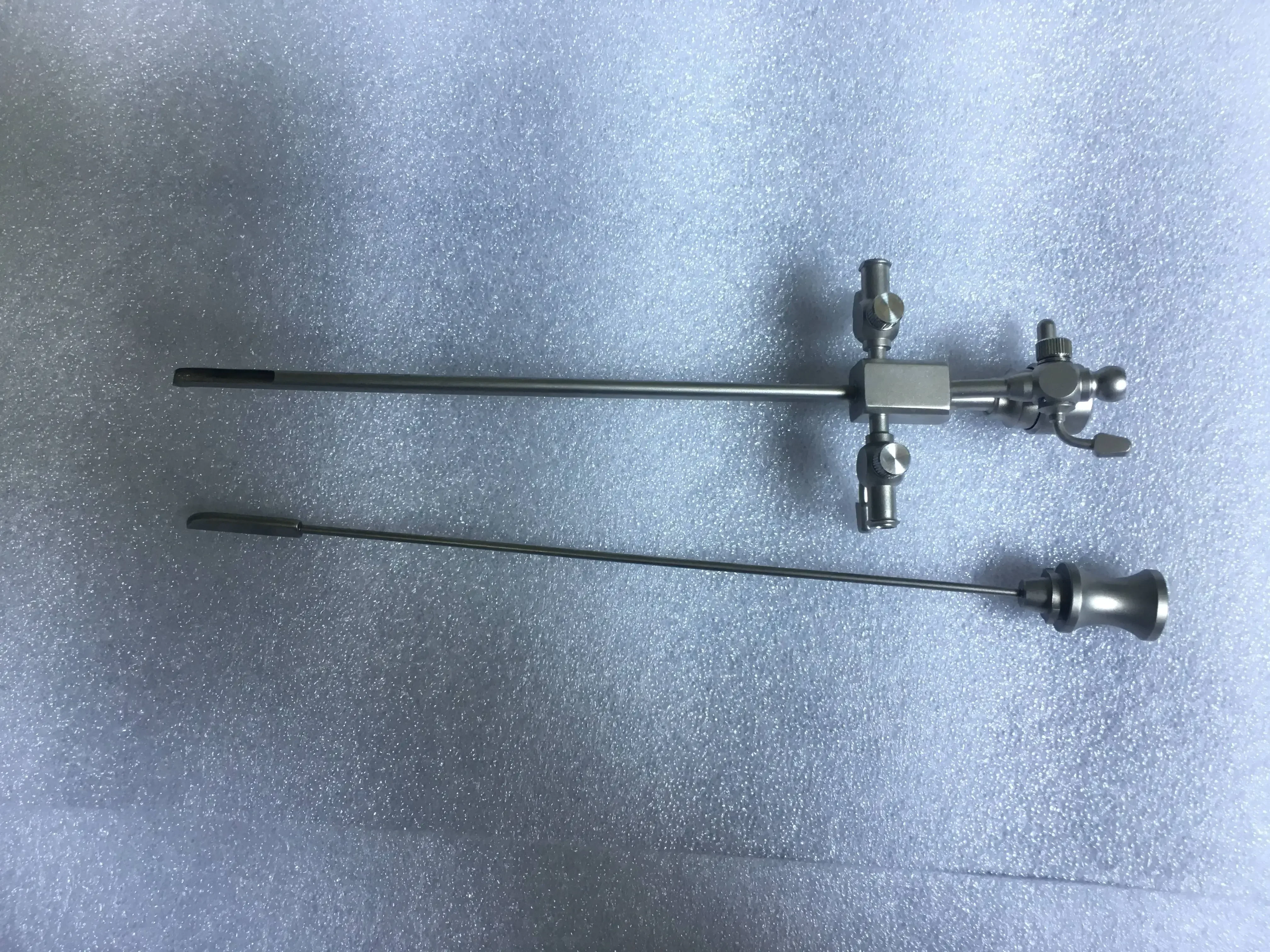 

Оболочка с obturator 11Fr x1 и уплотнительной крышкой x 10