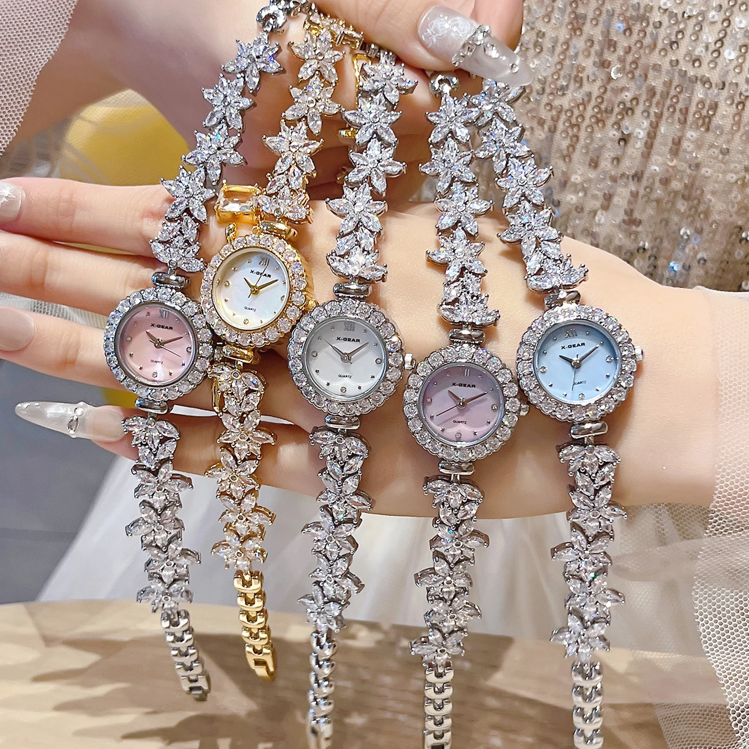 ساعة X-GEAR بسوار على شكل زهرة الوستارية الماسية |   ديناميكية وأنيقة للفتيات