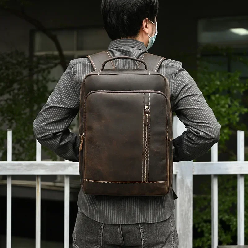 Mochila de piel de vaca Natural para hombre, morral escolar de gran capacidad a la moda, para ordenador portátil, 2024