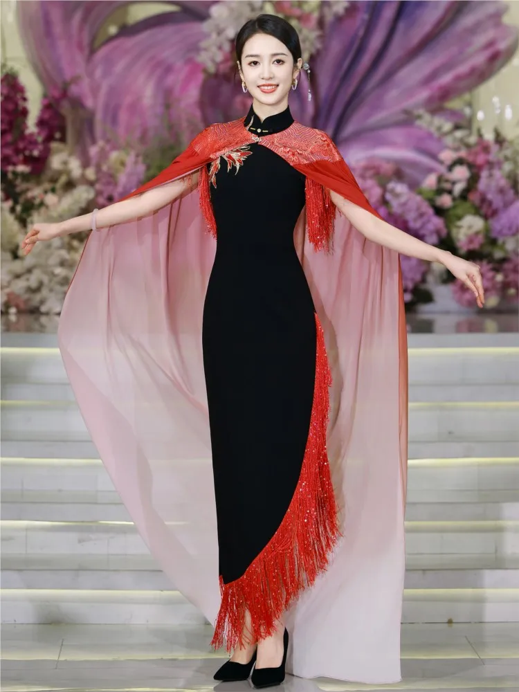 

A new black Latin-style cheongsam with slanted hem and long red tassel dance dress
