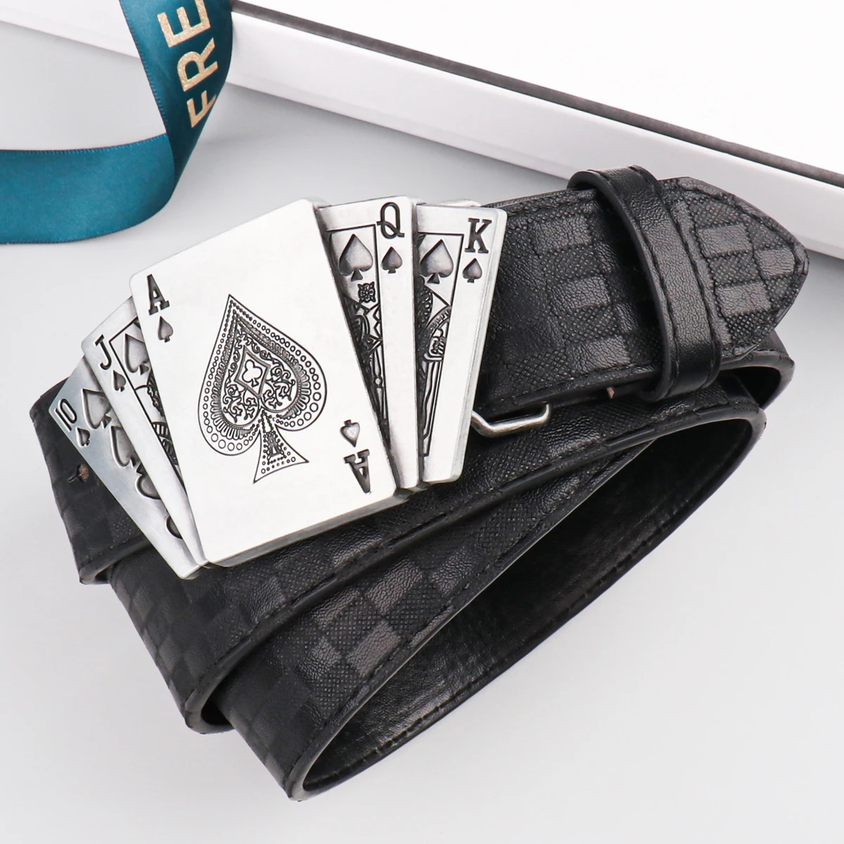 A fashionable men's playing card buckle PU belt