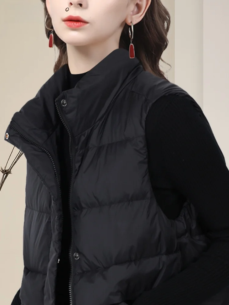 Stylowa, lekka kamizelka puchowa damska, biała, z puchu kaczy, ciepła, bawełniana kurtka, dojazdy do pracy, prosty krój.