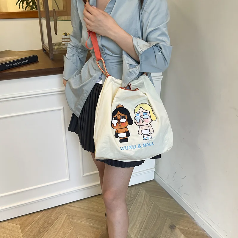 

Сумка-тоут с вышивкой из мультфильма. Повседневная и удобная сумка на одно плечо. Подходит для покупок и универсальная сумка через плечо.