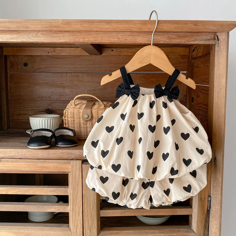 2026 Summer 2PCS Heart Print Cotton Baby Girls Suits Sleeveless Bow Double Layer Apricot Strap Top Toddler Shorts Set, Versatile