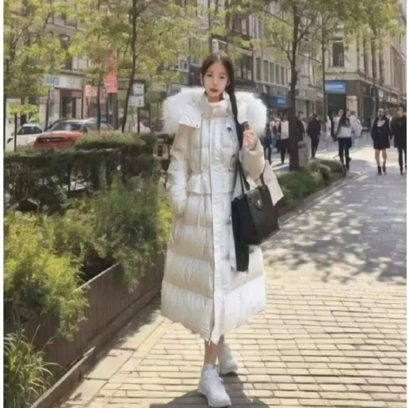 2026 سترة طويلة للنساء الشتاء مقنعين مع كبيرة الفراء طوق Cinched الخصر جديد الراقية معطف دافئ الوردي الملابس النسائية