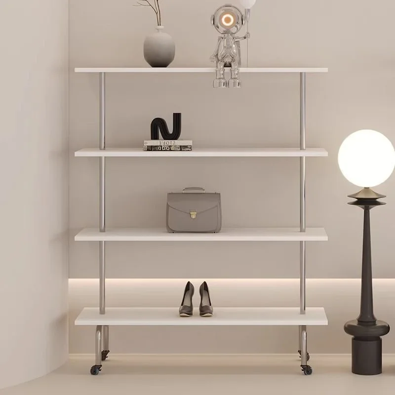 shoe display rack, black shelf in clothing store, multi-layer floor-to-ceiling display of women's clothing, mobile bag with  .