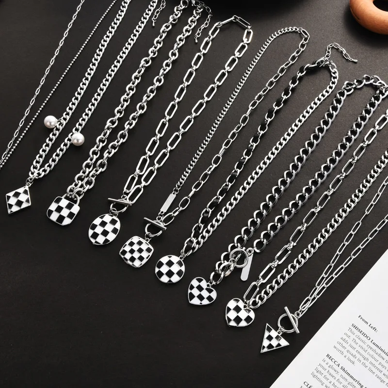 

Titanium steel spliced niche design black and white checkered necklace, checkerboard heart pocket necklace, checkered pendant