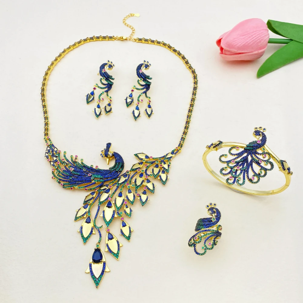 

Новое поступление, дизайн в форме павлина, высококачественный позолоченный латунный комплект ювелирных изделий с цирконом, роскошный браслет, кольцо, ожерелье, серьги