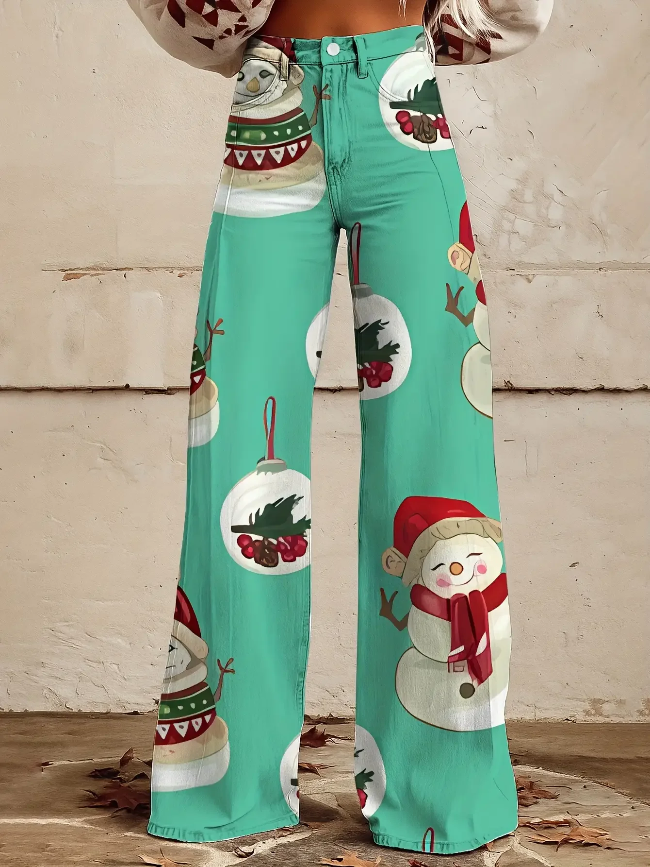 Ladies' imitation denim pants featuring Santa Claus, snowflakes, pine cones, and star patterns for autumn and winter