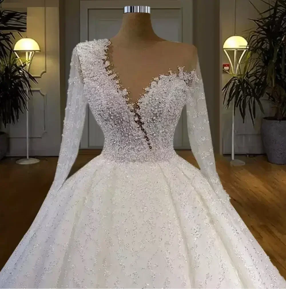 Customized New Arrival Luxury Elegant Lace Wedding Dress Long Sleeve Beaded Ball Gown Big Train Bridal Gown
