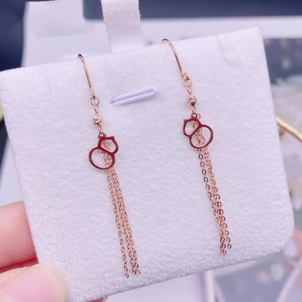 

Женские серьги-подвески из розового золота 18 карат