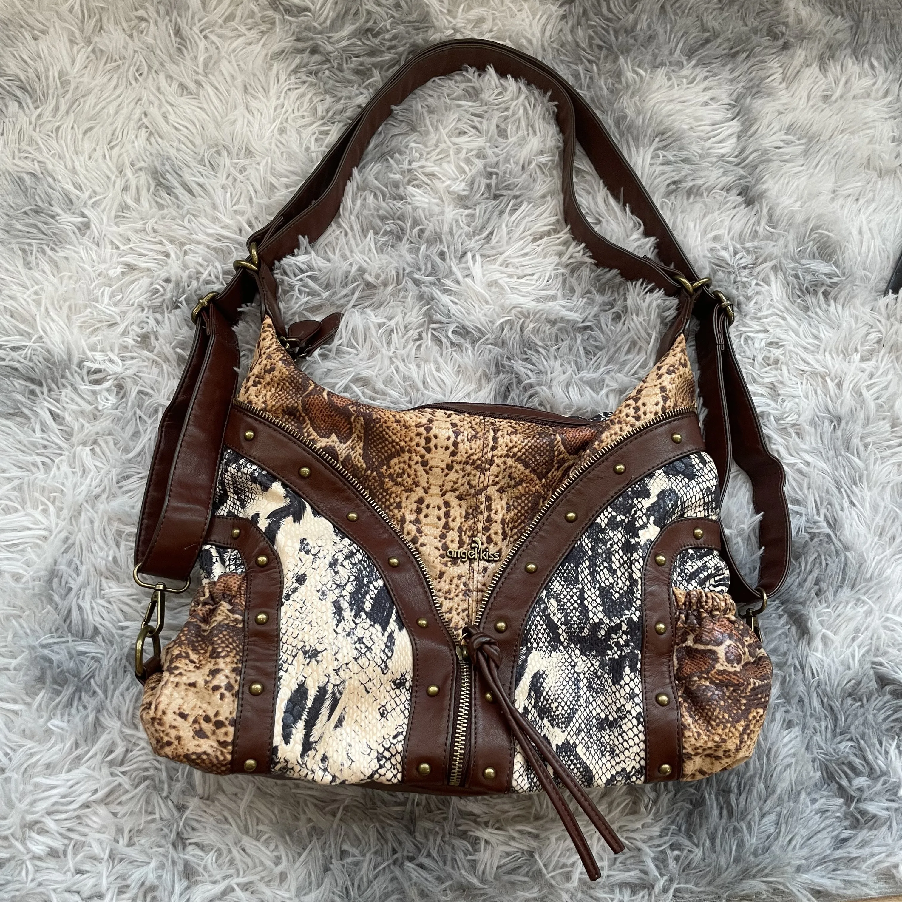 

Original Niche Design Brand New High Quality Backpack Rivets Retro Leopard Print Shoulder Crossbody Bag for Women Hot Sale