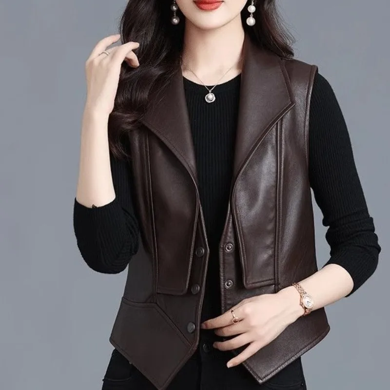 เสื้อกั๊กหนังเทียมผู้หญิง แฟชั่นฤดูใบไม้ผลิและฤดูใบไม้ร่วงใหม่ ทรงเข้ารูป แจ็คเก็ตหนังแบบไม่มีแขน สไตล์ลำลอง เสื้อกั๊กหนัง PU แบบสั้น เนื้อนุ่ม