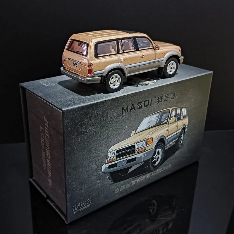 In stock: 1:64 1994 model of Land Cruiser LC80 gold alloy high-end simulation car model creative decorative item, festival gift