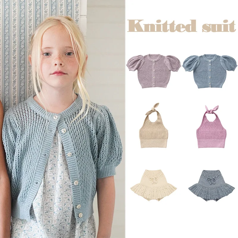

Детский свитер 2026: Летний комплект в деревенском стиле для девочек — однотонный вязаный кардиган с открытым плетением и юбка