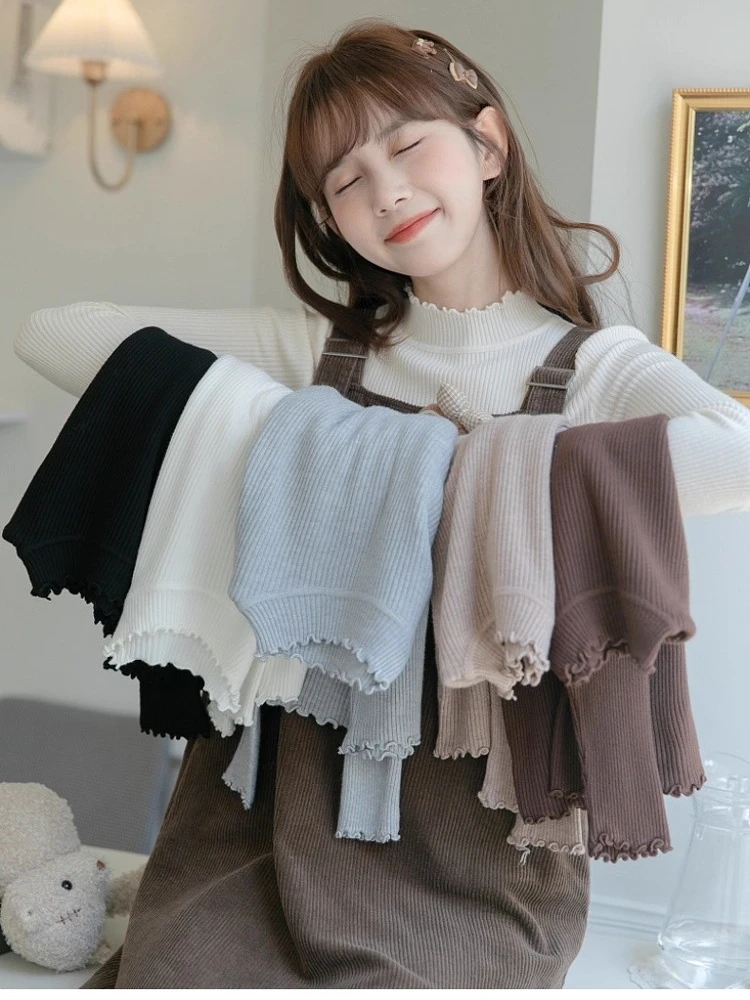 2025 Otoño Invierno capa Base Simple Tops suéter de punto para mujer borde de oreja de madera cuello alto jerseys de manga larga ropa de mujer