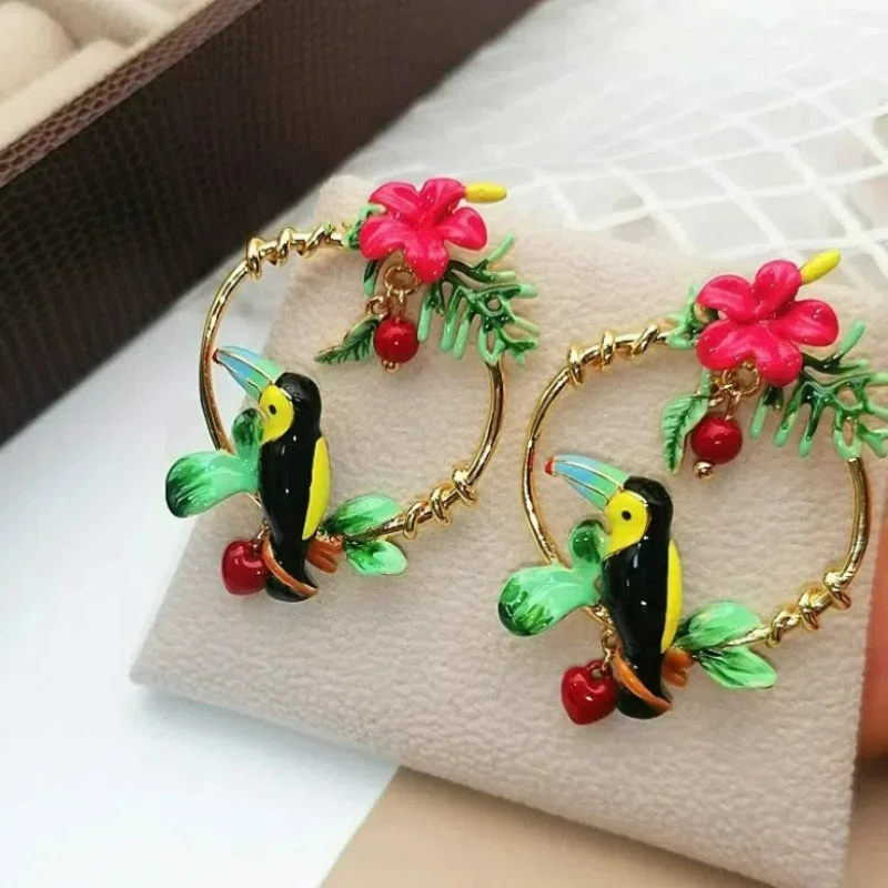 

Trendy Hand Painted Enamel Pink Green Leaf Red Heart Tassel Cute Parrot Bird Toucan Stud Earrings for Women Christmas Earrings