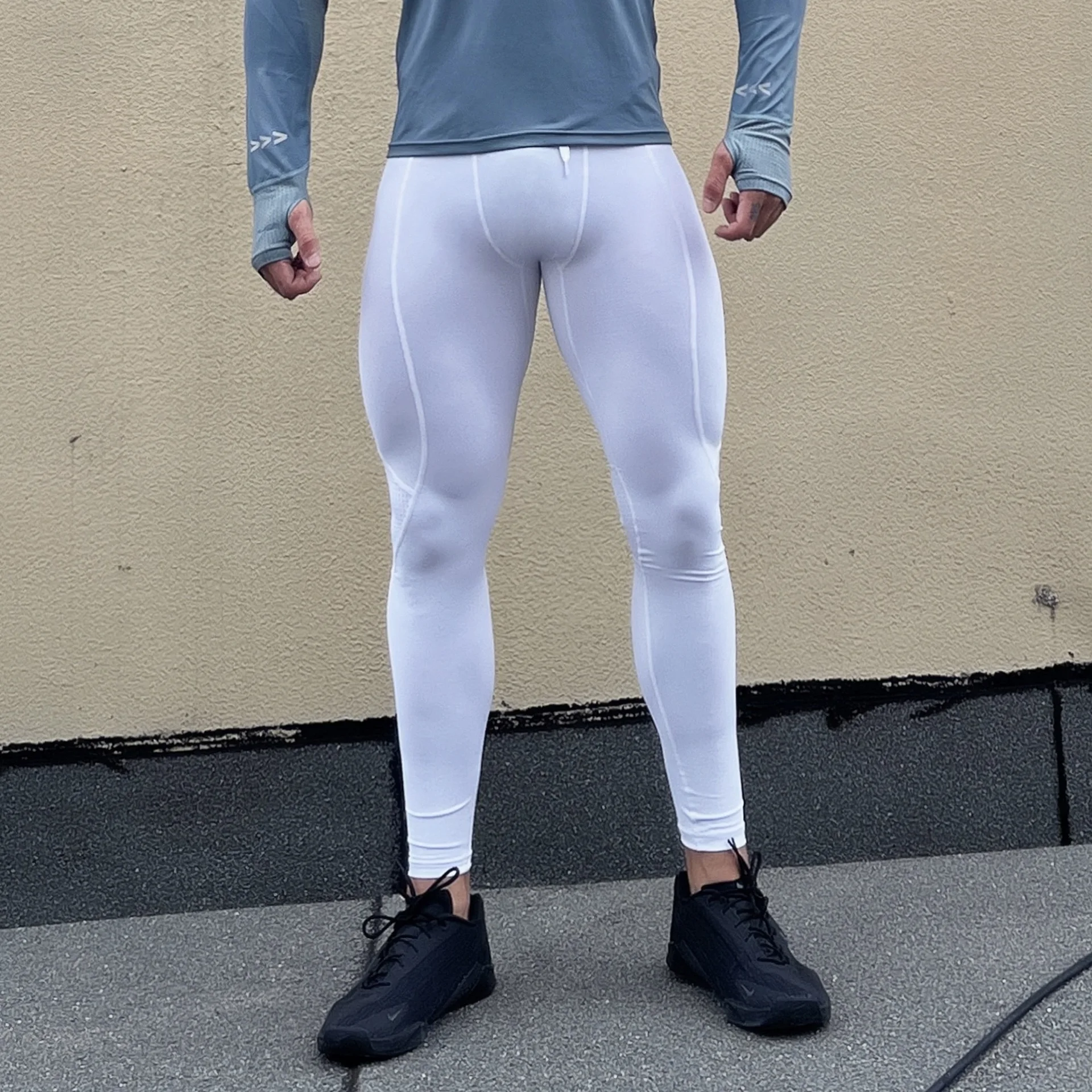 Ginásio bull masculino malha respirável alta estiramento retalhos calças de treinamento primavera/outono calças apertadas secagem rápida sweatpants leggings