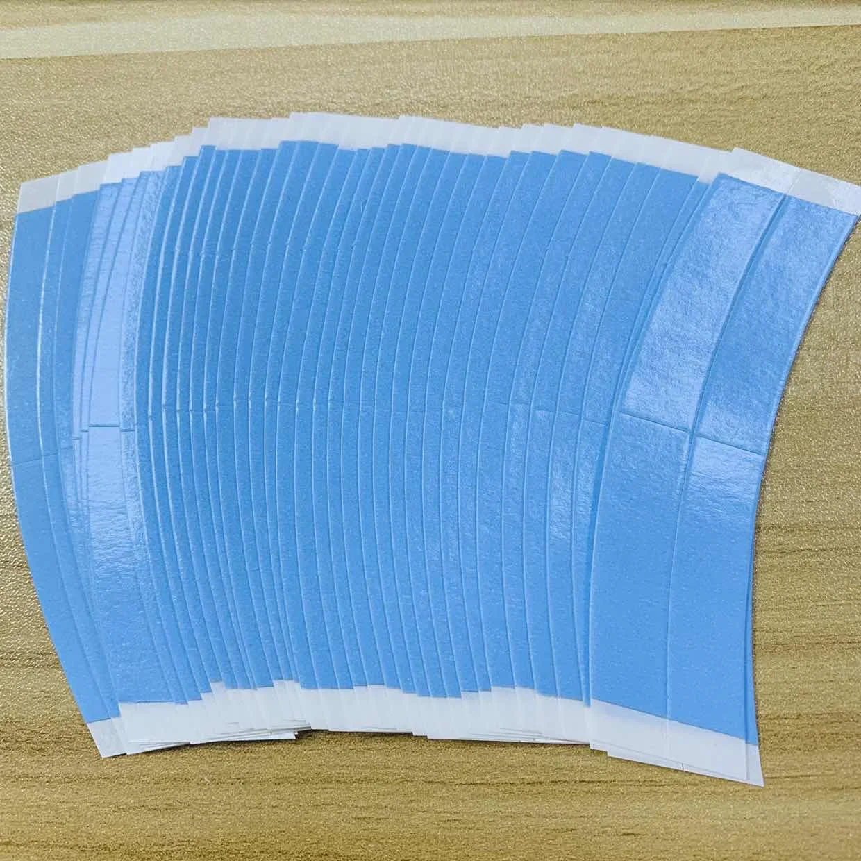 

Оптовая продажа, 36 шт., супер прочная лента для парика, двойная клейкая лента-удлинитель, водонепроницаемая лента для париков/кружевных париков, пленка C-образной формы