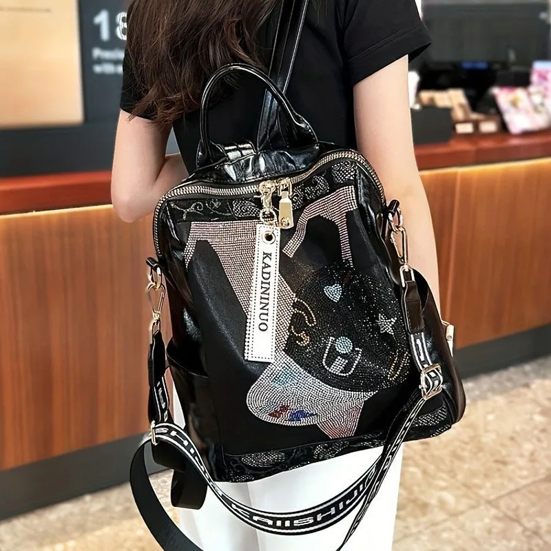 Mochila negra con diamantes de imitación Hotfix a la moda, mochila de cuero de gran capacidad para Mujer, Mochilas de lujo asequibles de gama alta para Mujer