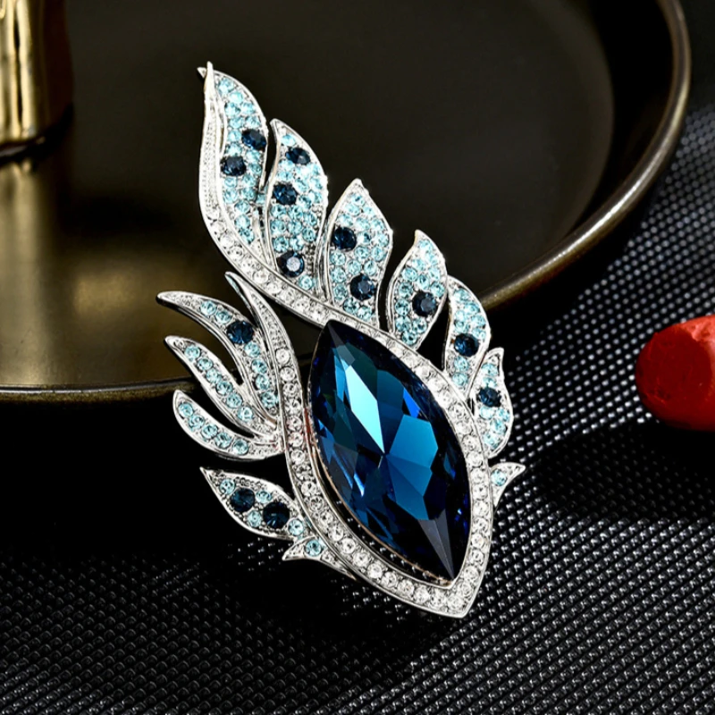 Trendy Blue Purple Crystal Phoenix Eye Feather Brooches For Women Rhinestone Flame Shape Pins Coat Jewelry Accessries Gifts