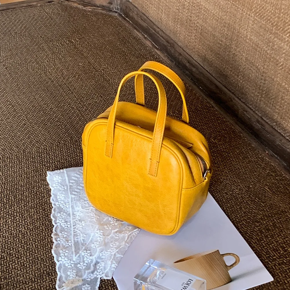 

Новая универсальная женская сумка-подушка из натуральной кожи 2026 года в ретро-стиле, портативная, маленькая, квадратная, через плечо, с уникальной текстурой, стильная и простая