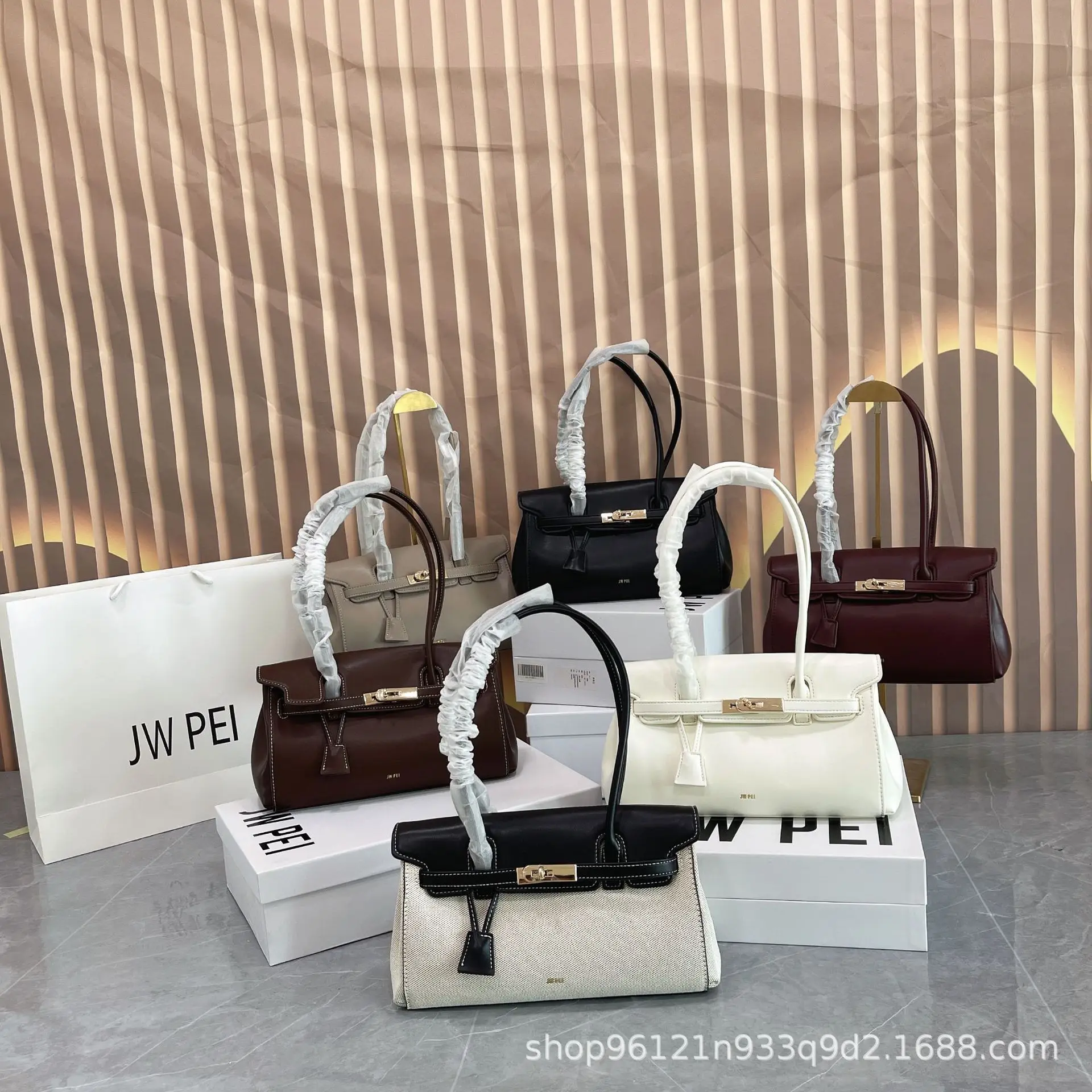 

JW PEI Law Stick Bag for Women 2026 New Small Design Lock Handheld Single Shoulder Underarm Bag