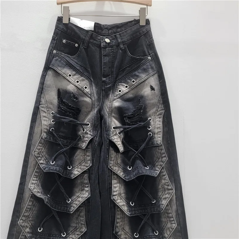 

Architectural Lace-Up Wide-Leg Jeans. This US-style heavy-duty denim offers a bold, slimming silhouette for an edgy look.
