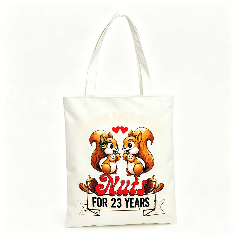 Couple's canvas tote bag with squirrel and heart graphic, ideal for casual daily use and anniversary outings