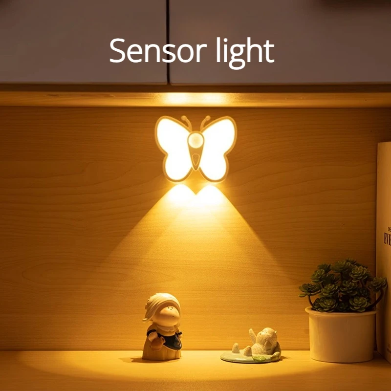 

Светодиодный настенный светильник-бабочка с датчиком движения, прикроватный светильник для спальни, гостиной, шкафа, лестницы, декоративный ночник, перезаряжаемый, с регулировкой яркости