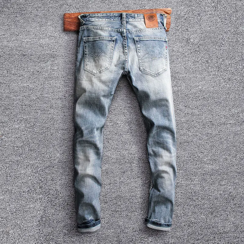 

Designer Fashion Men Jeans Retro Light Blue Stretch Slim Fit Ripped Jeans Men High Quality Y2K Buttons Vintage Denim Pants Homme