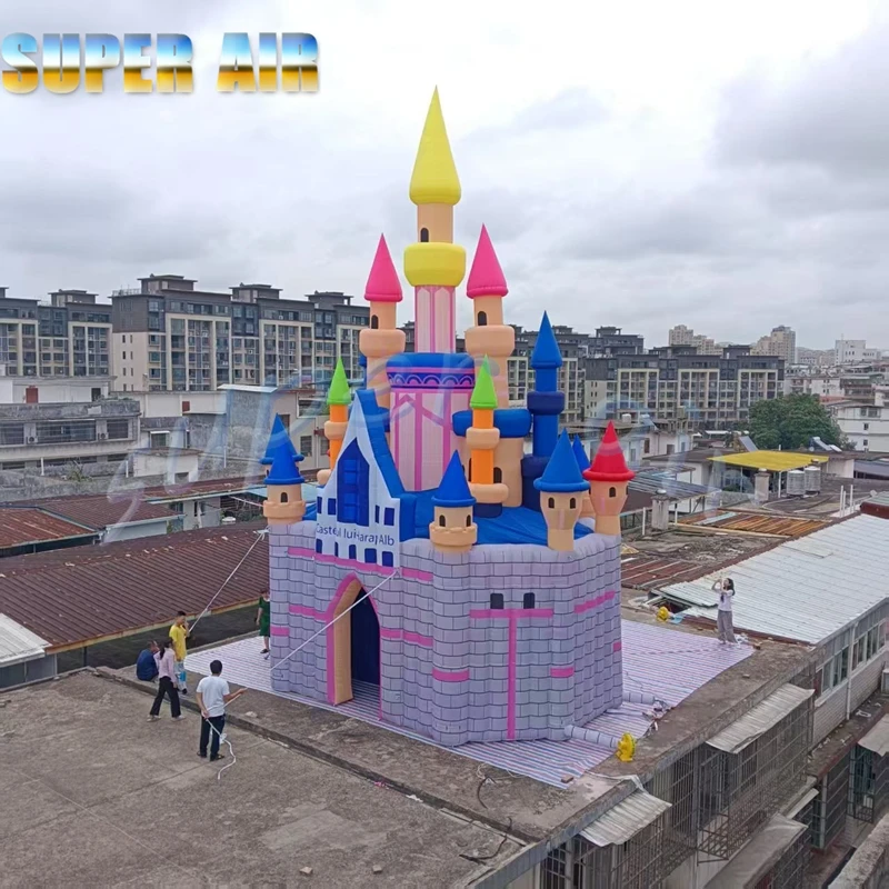 Parque de atracciones para niños, castillo colorido inflable gigante para exteriores con soplador a la venta