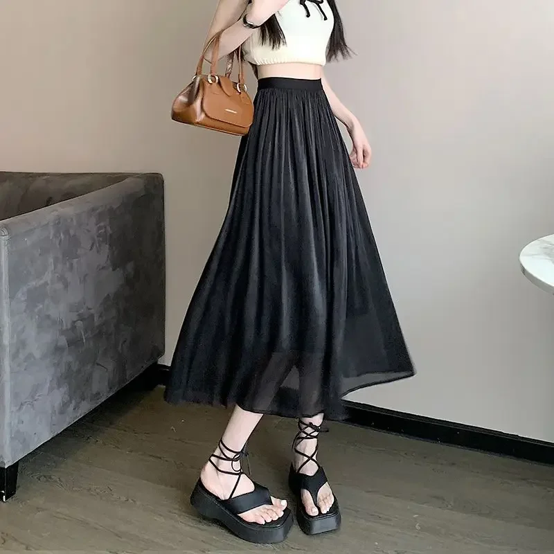 2024 New Summer Fashion High Waist Covering Belly Loose Relaxed Vacation Simple Solid Color Mid Length Flowing Light Skirt