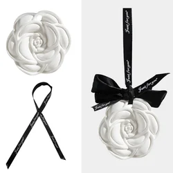 Indoor ceramic stone fragrance diffuser hanging for home use solid light car aromatherapy camellia pendant decoration