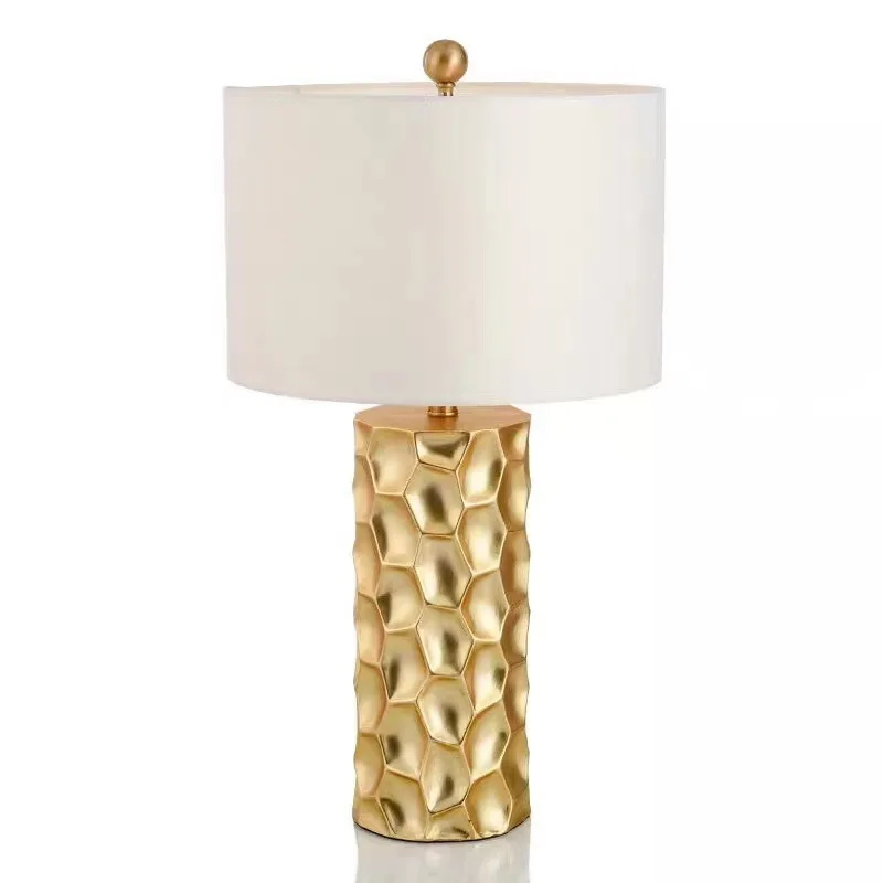 Modern simple and creative hardware resin gold table lamp American bedroom American bedside model room table lamp