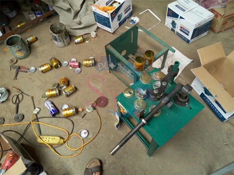 ماكينة إزالة علب القصدير اليدوية عالية الأداء/ماكينة إعادة تدوير علب البوب من الألومنيوم معدات فصل إعادة تدوير علب الألومنيوم