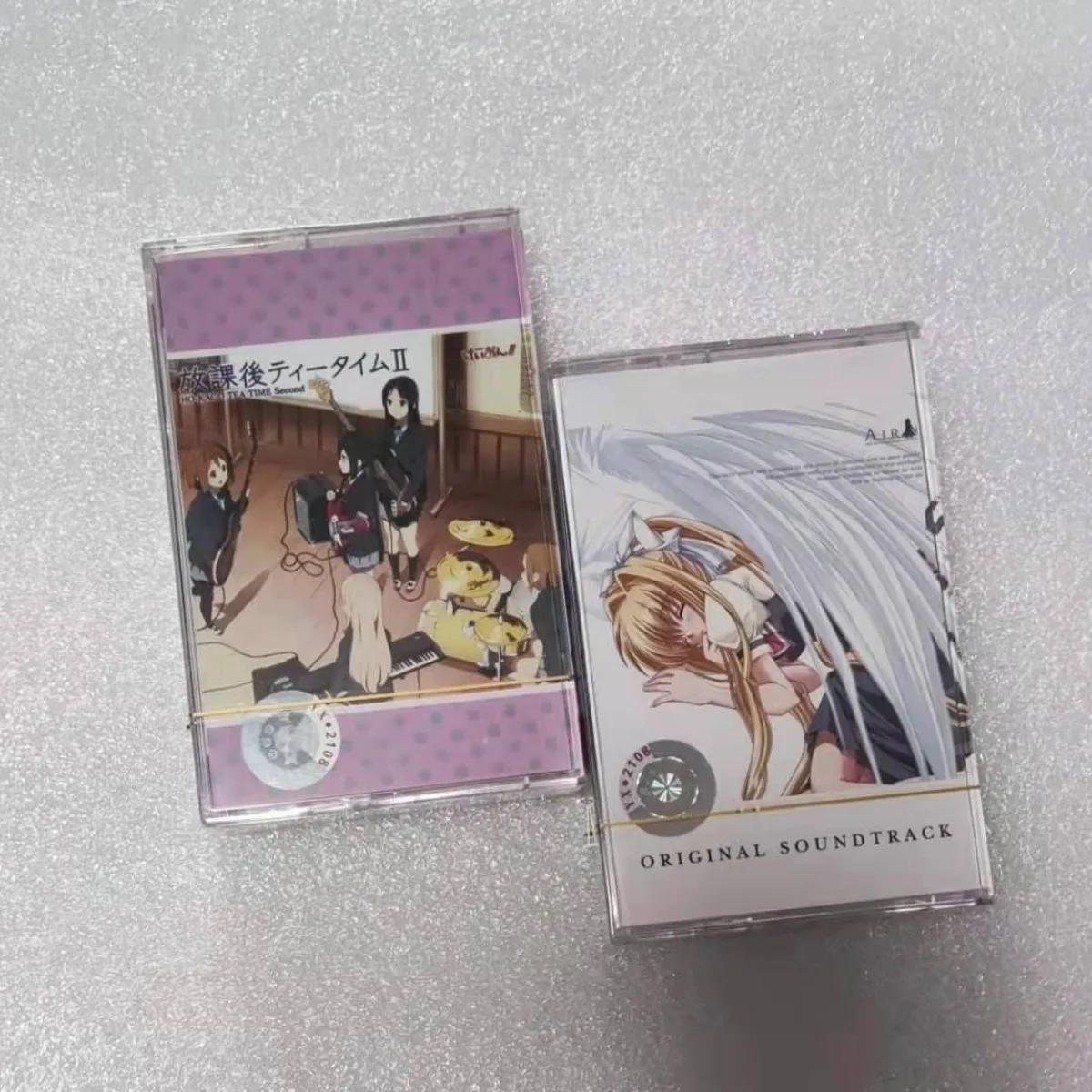 

K-On! Houkago Tea Time II & AIR Original Soundtrack - Iconic Anime Pop & Emotional OST Cassette Tapes