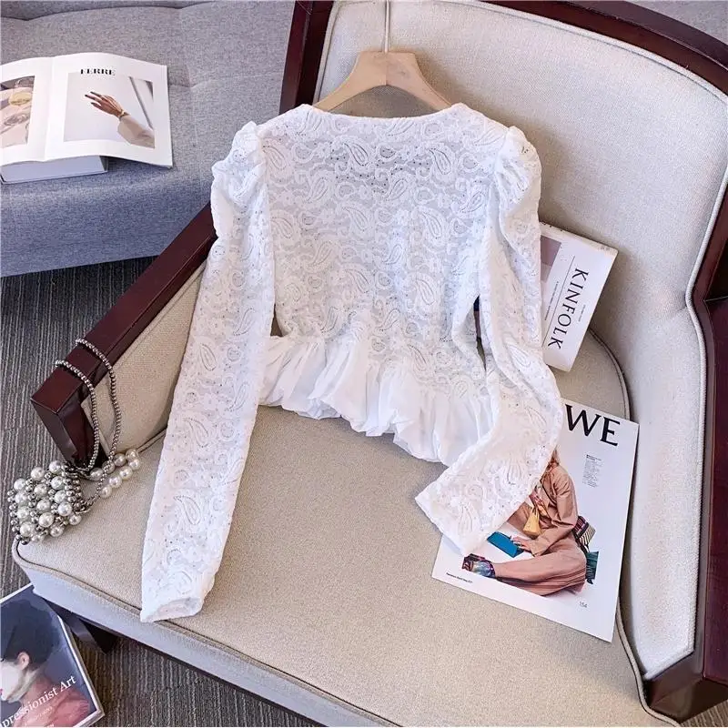 French openwork lace shirt women's spring and autumn new fashion temperament lotus leaf stitching design sense craft coat