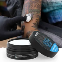 Bálsamo para tatuajes de 2,47 oz/70 g, con aroma a coco y vainilla, hidrata, mantiene la claridad y hace nuevos tatuajes más vibrantes.