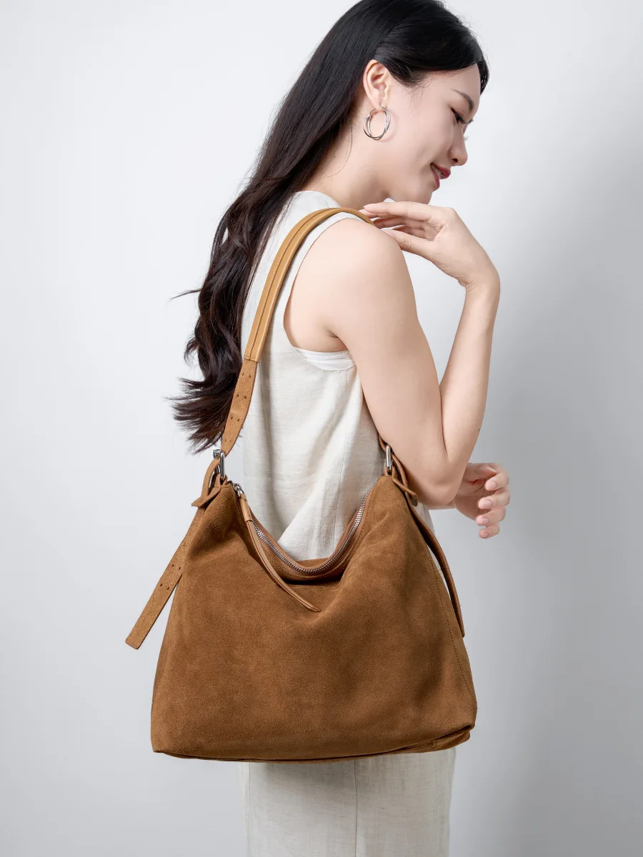 

Suede crossbody large capacity women's light luxury commuting high-end sense shoulder bag casual armpit top layer cowhide tote