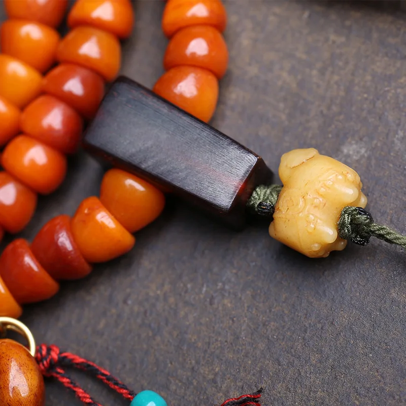 Hand-Held Gold Bowl Made From Recycled Yak Bone With 18 Buddhist Beads, Yujian Earpiece Material, And Sandalwood Three-Way Conne